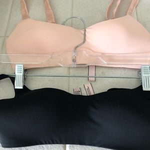 Victoria Secret’s 32A black & pale bras.
